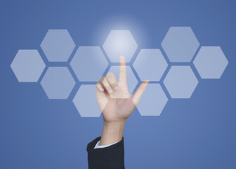 Hands touching button on screen interface.