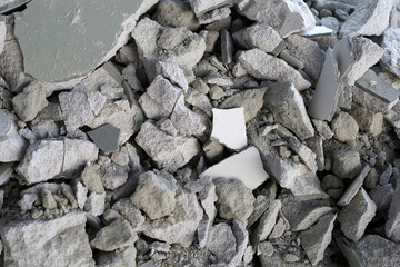 Broken concrete, Piles of lightweight construction bricks after house demolition
