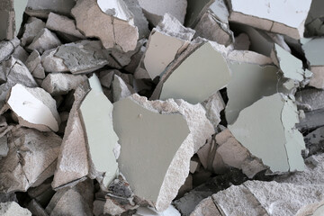 Broken concrete, Piles of lightweight construction bricks after house demolition