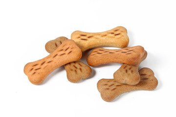 Dog biscuit shaped like a bone on a white background