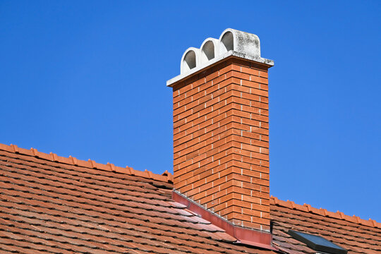 Roof of a building with smoke stack