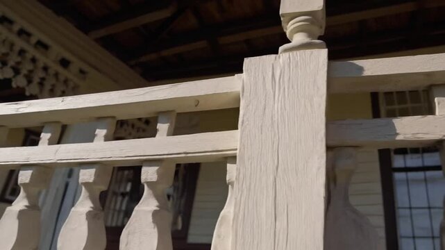 old Queenslander style cottage with corrugated iron roof and verandahs