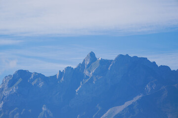 Scenic landscape with mount Pilatus in the background on a summer day seen from Swiss city of Emmen. Photo taken August 25th, 2025, Emmen, Switzerland.