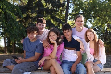 Fototapeta premium Portrait of happy teenage friends together outdoors