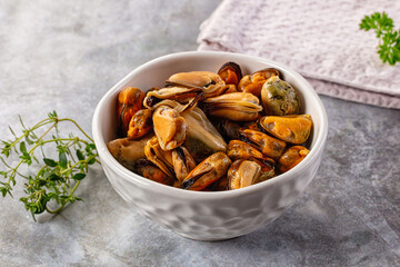 Peeled mussels heap in the bowl