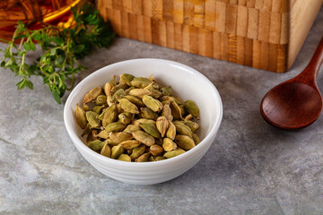 Green dry cardamom heap spices aroma