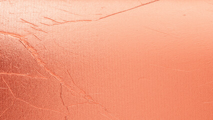 Peach plaster wall texture with soft rough surface and gradient shades, warm abstract background...