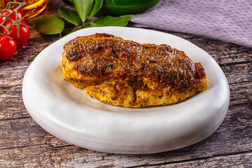 Baked chicken breast with spices and herbs