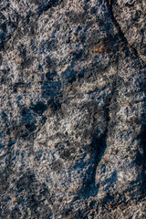 Close-up of granite rock surface with natural texture