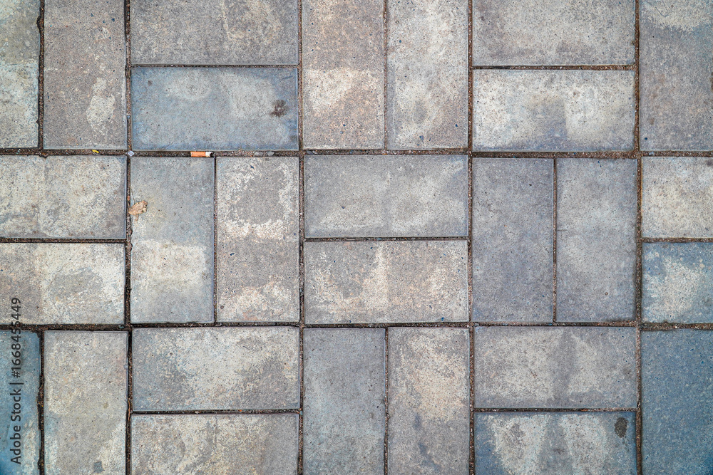 Poster a textured gray paving stone pattern makes a versatile backdrop. irregular shapes and slight color v