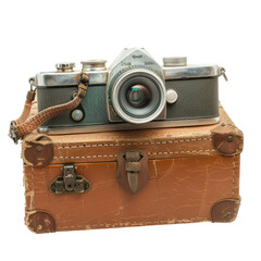 Vintage camera on a worn suitcase