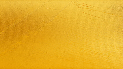 Golden plaster wall texture with subtle cracks and rough surface, elegant abstract background for luxury, festive, and decorative design.