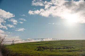 Agricultural pivot on a regenerative agriculture farm. Sustainable agriculture in Australia. Round pivot. Circular cropping.