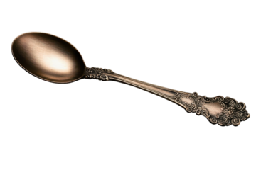 Antique spoon featuring an ornate engraved handle with detailed patterns and a smooth- brushed finish. Ideal for vintage dining or as decorative collectible. Isolated on transparent background- png.