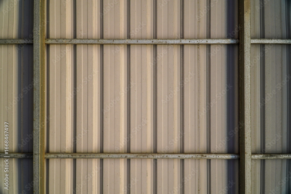 Poster abstract metal texture with a ribbed pattern, showcasing architectural structure and industrial desi