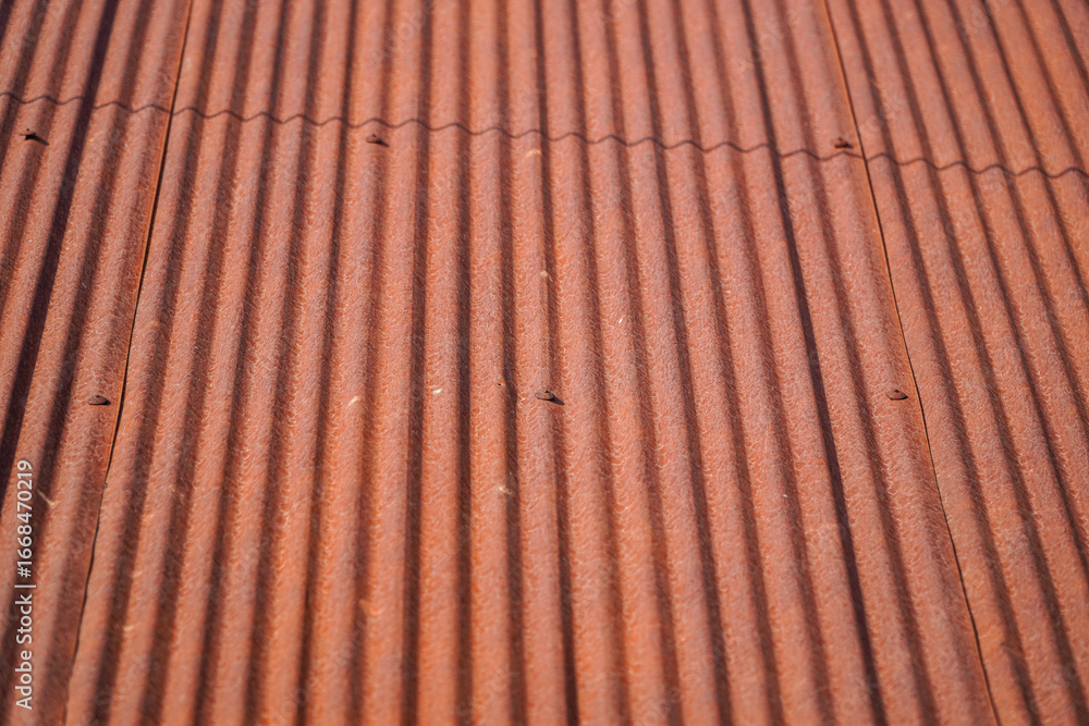 Poster a close-up view showcases a patterned corrugated surface, rich with textures and linear design. the 