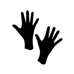 Fototapeta premium Black handprints on white background create a dynamic contrast and evocative image