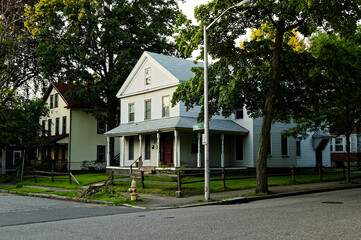 Charming Victorian style house With Front Porch And Picket Fence