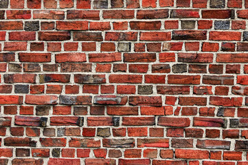 Close-Up View Of Weathered Red Brick Wall With Rustic Texture