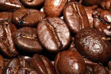 Close up of dark roasted coffee beans deep brown and tasty close up