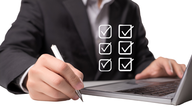 Businessperson completing checklist on laptop