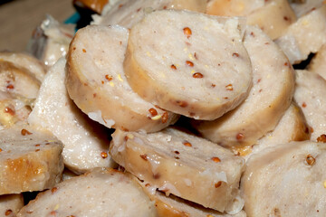 Sliced pepper sausages cooked and ready to be used as a pizza topping