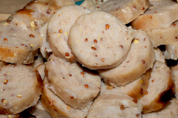 Sliced pepper sausages cooked and ready to be used as a pizza topping