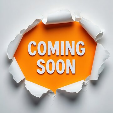 Bright orange background revealed through torn white paper with the words coming soon