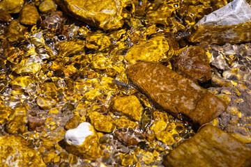 Water flowing in a small mountain river - Italy