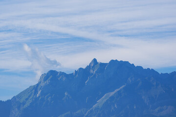 Scenic landscape with mount Pilatus in the background on a summer day seen from Swiss city of Emmen. Photo taken August 25th, 2025, Emmen, Switzerland.