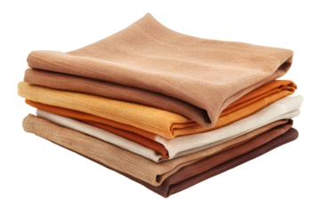 Stack of earthy tone fabrics folded neatly