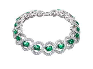A stunning diamond and emerald bracelet with intricate detailing, showcasing a luxurious and elegant design.