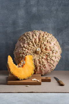 Galeux d' Eysines Pumpkin With Slice On Table