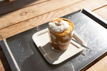 Einspänner coffee (Vienna coffee). Coffee topped with cream.