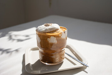 Einspänner coffee (Vienna coffee). Coffee topped with cream.