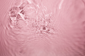 Gentle Water Ripples with Soft Pink Background and Elegant Texture