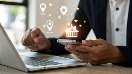 Businessman uses a smartphone while working on laptop with holographic overlay showing a storefront icon, location pin, and five star rating