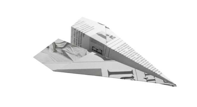 A folded paper airplane crafted from newspaper pages, poised for flight against a stark white background, symbolizing creativity and imagination.