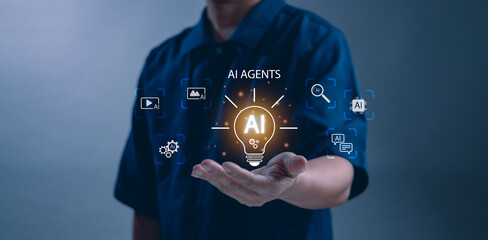 Person holding glowing AI light bulb icon with virtual interface,concept of symbolizing artificial intelligence,innovation, smart technology, automation and digital transformation in modern business