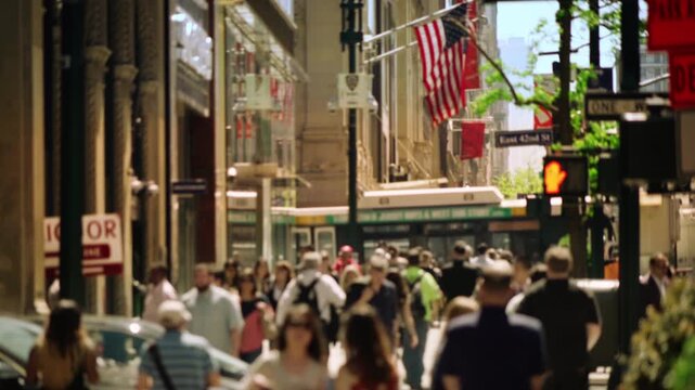 Busy Urban Street In New York City With American Flag, Crowds Of People, Traffic, Architecture And Vibrant City Life Representing Tourism, Culture, Business And Daily Urban Lifestyle.