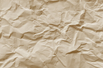 Textured crumpled light brown paper is perfect for backgrounds in design projects, scrapbooking, invitations, and craft projects. Great for adding depth.