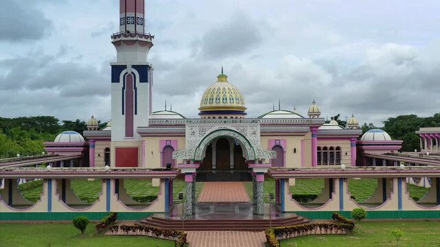 Barishal, Bangladesh - 22 August 2025: Aerial view of Baitus Salam Jame Masjid showcasing its unique architectural design, domes, and surrounding greenery.
