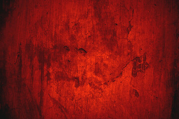 Textured, stained surface with dark red hue suitable for backgrounds or graphic design projects. Ideal for artistic or grunge themes.
