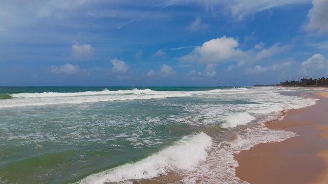 Drone Ground Skim Push In with Yaw Across Tropical Shoreline and the Sea