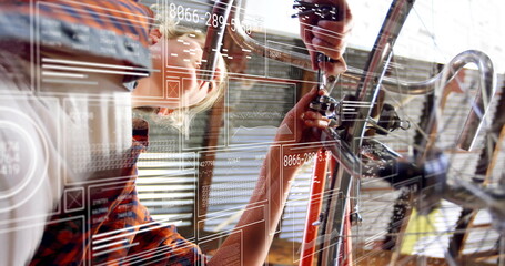 Female bicycle mechanic wearing apron adjusting handlebar stem in repair workshop, with AR overlays