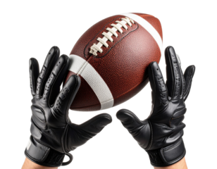 Hands in black football gloves catching brown leather football with white laces, showcasing athletic grip and sports equipment.