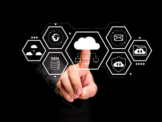 Cloud technology and data management. A businessman uses a touchscreen interface to connect cloud storage, email, and secure data systems in a modern office for smart business solutions.