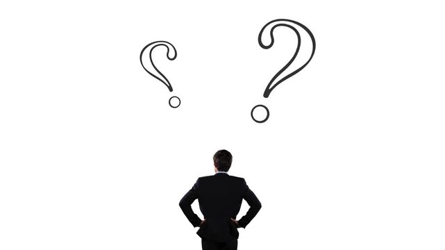 A businessman in doubt, having to choose between two different choices indicated by arrows pointing in opposite directions concept