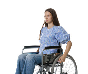 Beautiful teenage girl in wheelchair on white background