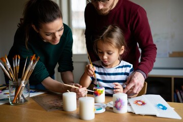 Creative family art session home activity indoor close-up family bonding through painting
